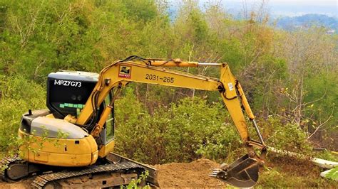 clearing grass with mini excavator|Clearing Land with a Mini Excavator: The Easiest Way.